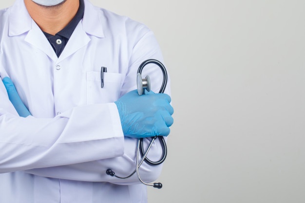 doctor-crossing-arms-while-holding-stethoscope-white-coat_176474-8491